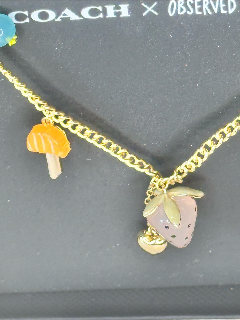Coach Gold-Tone Charm Necklace with Mushroom Star - Picture 5 of 7